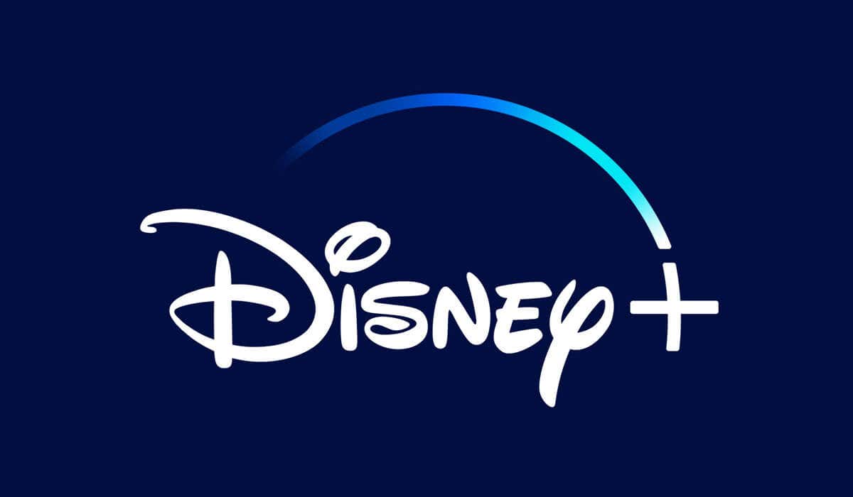 A flat-screen television displays the Disney+ sign-up screen
