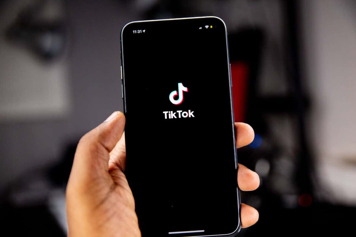 A smartphone displays the TikTok logo